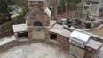Outdoor kitchen with pizza oven